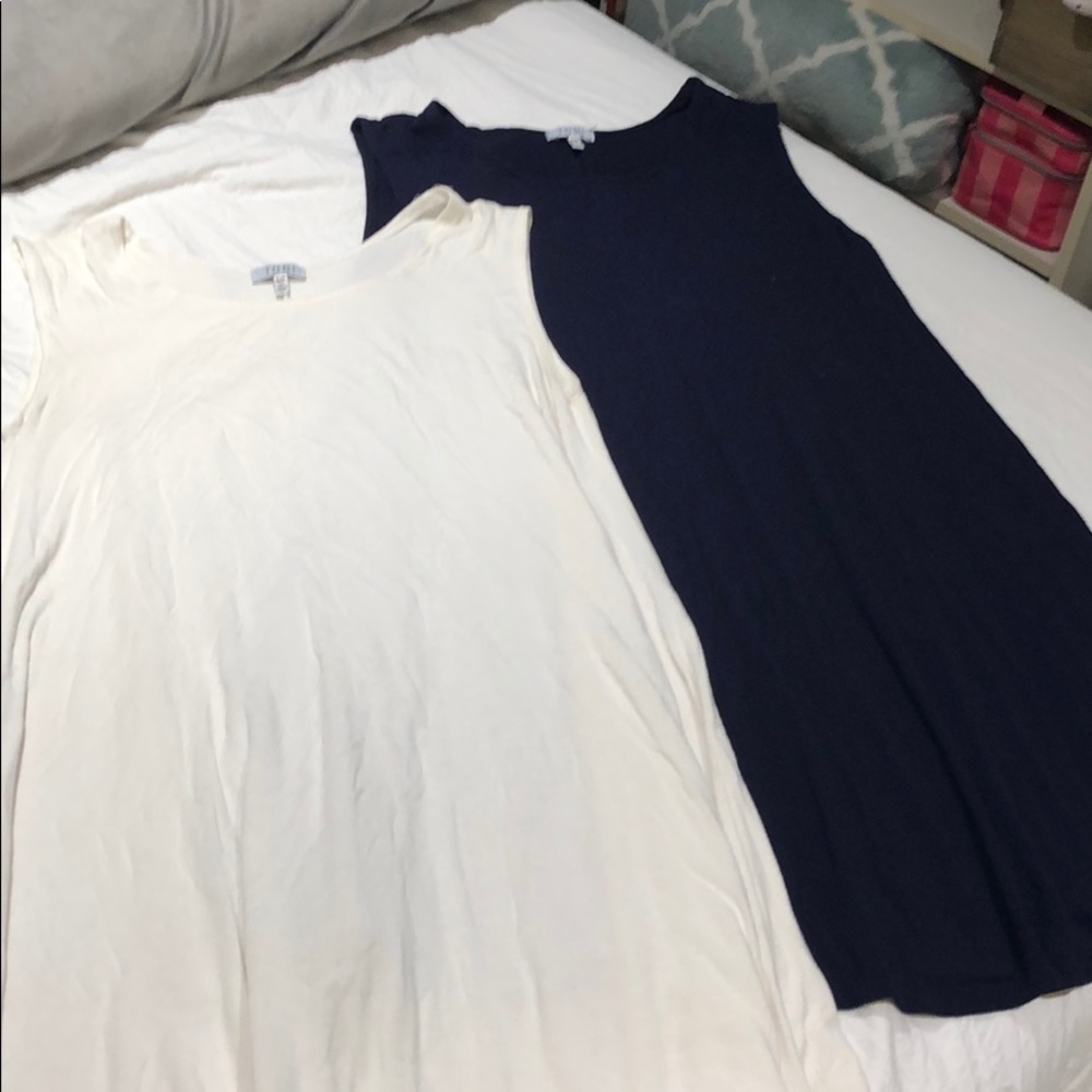 White and dark purple dresses